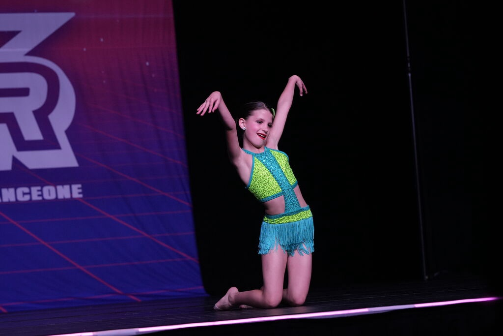 Upper level dancers rehearsing choreography