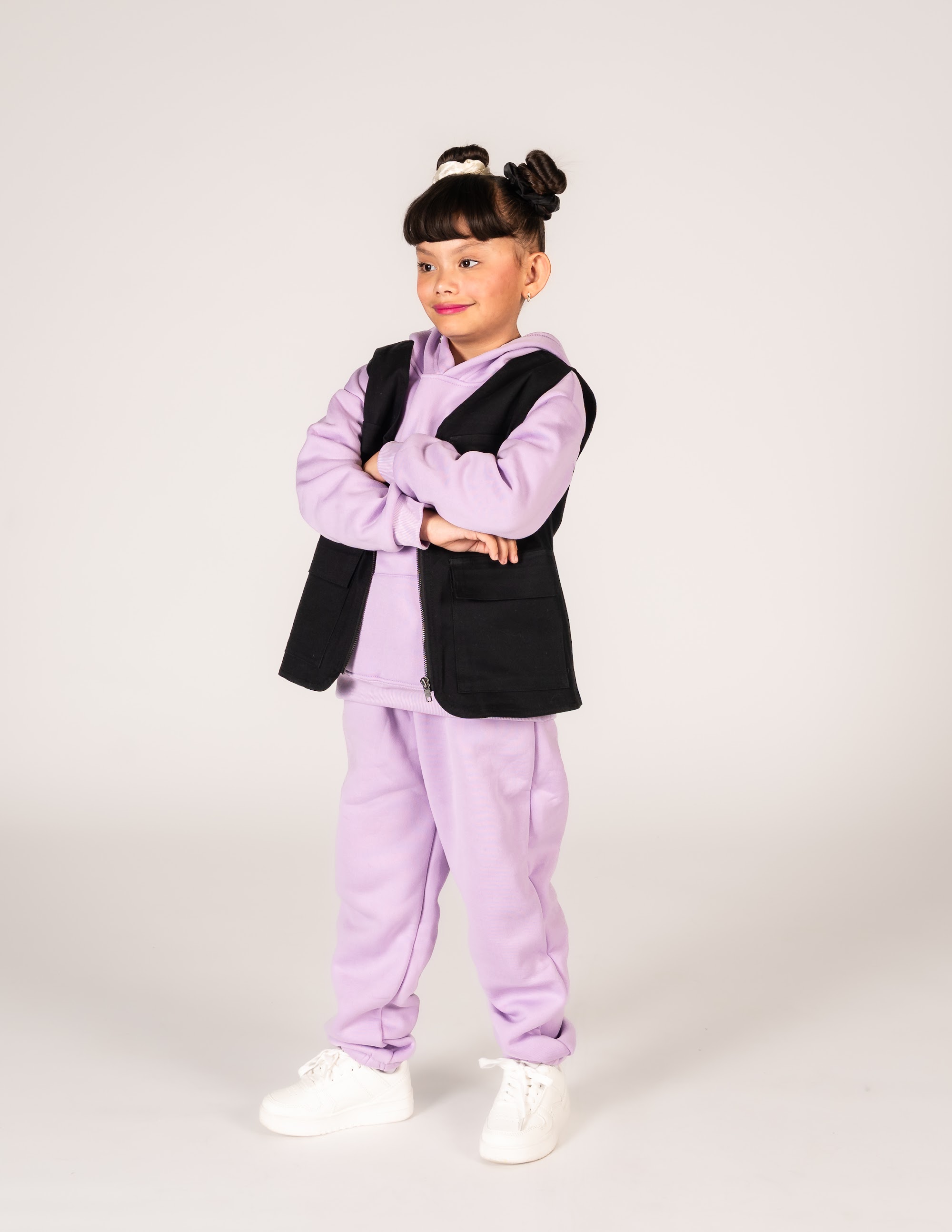 Hip Hop 2 dancer in a purple hoodie with arms crossed