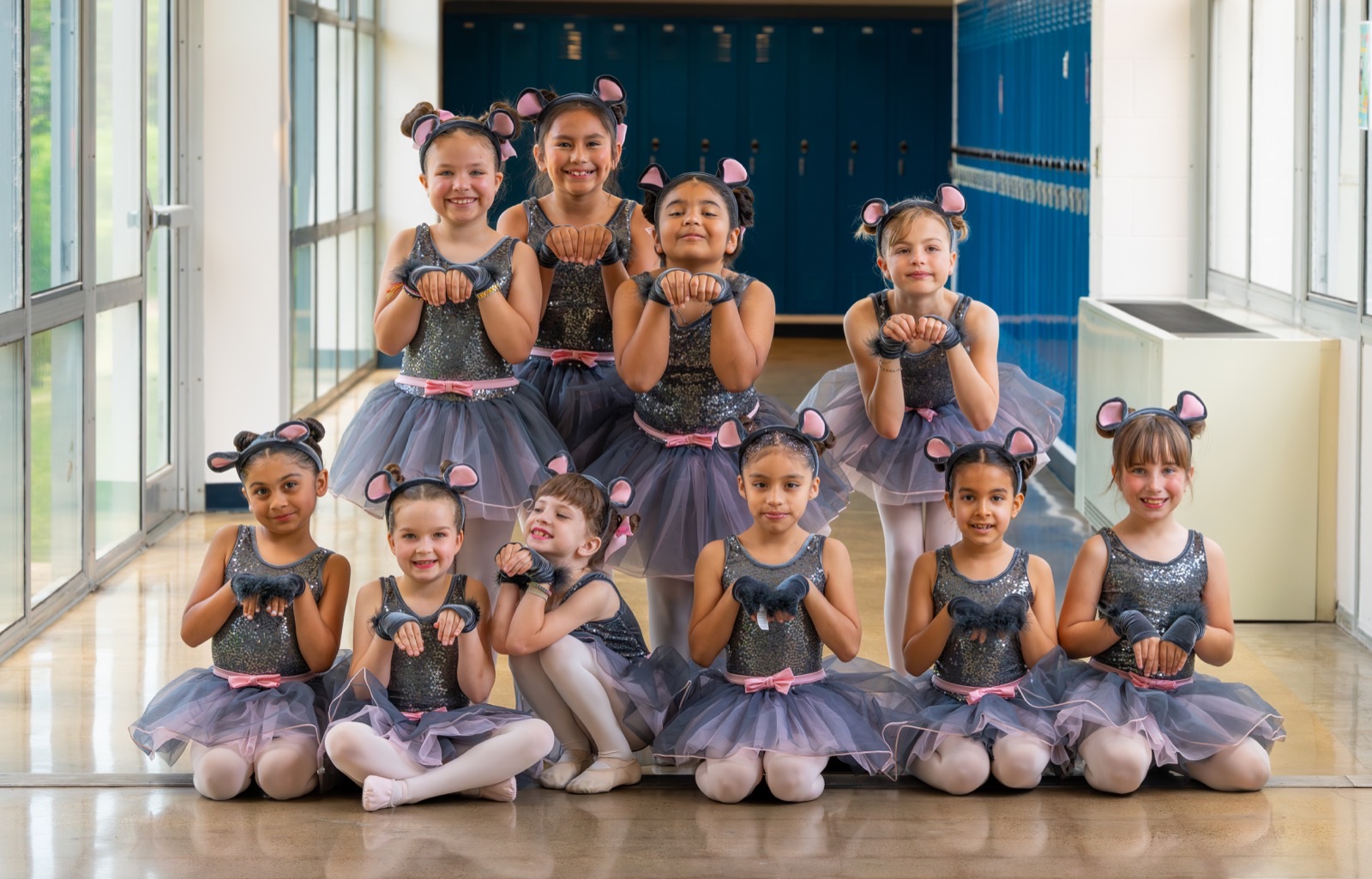 Oak Cliff Dance students in mouse costumes posed together for the fall class schedule