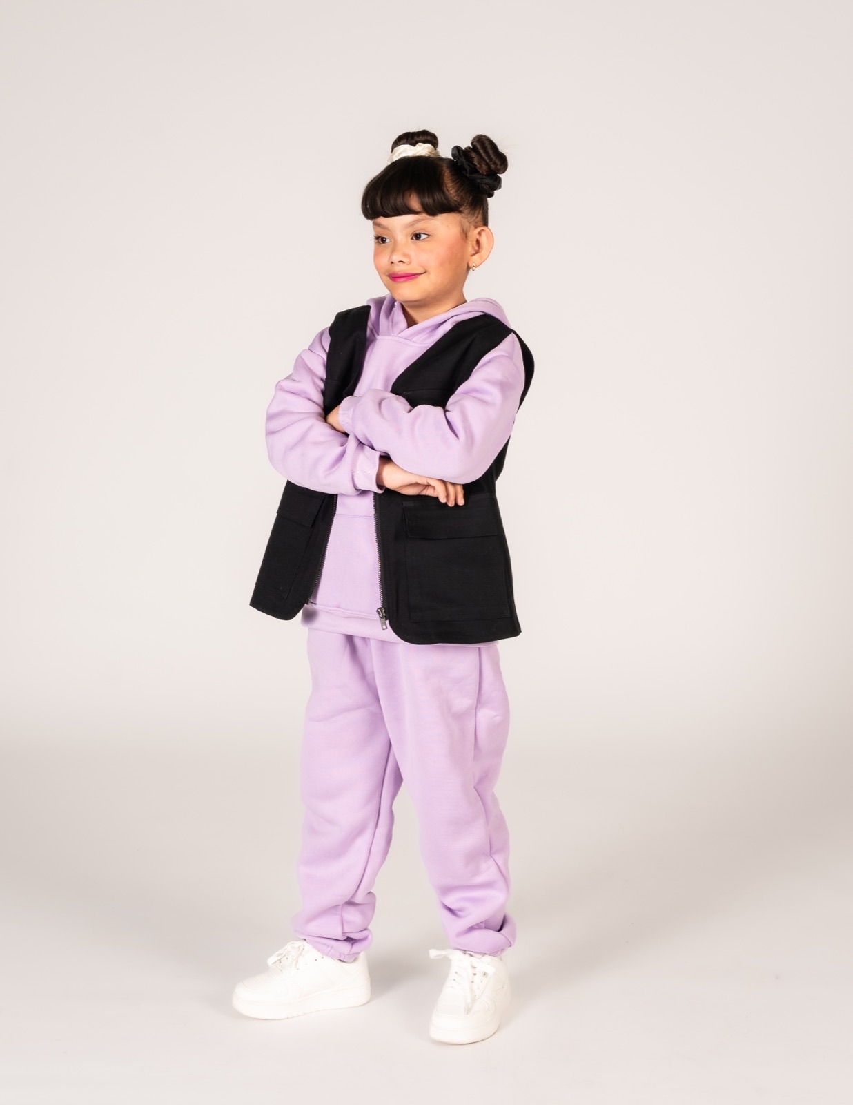 Hip Hop 2 dancer in a purple hoodie with arms crossed